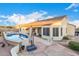 Inviting backyard featuring a sparkling pool, a covered patio, and lush greenery for relaxation at 9548 E Grandview St, Mesa, AZ 85207