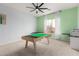 Bright playroom with large windows, tables and carpet floors at 9548 E Grandview St, Mesa, AZ 85207