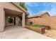 Spacious backyard featuring a covered patio, grilling area, and garden beds at 11410 W Davis Ln, Avondale, AZ 85323