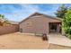 Backyard featuring desert landscaping, a covered patio, and a seating area at 11410 W Davis Ln, Avondale, AZ 85323
