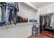 Walk-in closet offering ample storage space for clothing and accessories at 11410 W Davis Ln, Avondale, AZ 85323