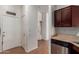 View of the pantry with access to front door at 11410 W Davis Ln, Avondale, AZ 85323