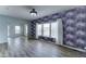 Inviting living room featuring modern flooring and abundant natural light from large windows at 11596 W Sierra Dawn Blvd # 165, Surprise, AZ 85378