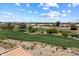 Scenic golf course view overlooking lush green fairways and desert vegetation at 11650 W Pincushion Ct, Surprise, AZ 85378