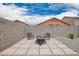 Cozy backyard patio with a fire pit and seating area for outdoor enjoyment at 1170 E Jardin Dr, Casa Grande, AZ 85122