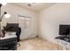 Home office space featuring tile flooring, bright light, and a window view at 1170 E Jardin Dr, Casa Grande, AZ 85122