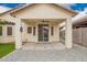Covered patio and view of the backyard, perfect for outdoor relaxation and entertaining at 1170 E Jardin Dr, Casa Grande, AZ 85122