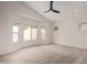 Spacious bedroom enhanced with multiple windows providing natural light at 11808 E Clinton St, Scottsdale, AZ 85259