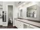 Bathroom with double sinks, ample counter space, and mosaic tiles at 1253 E Ivanhoe Ct, Gilbert, AZ 85295
