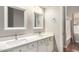 Bathroom with double sinks and granite countertops at 1253 E Ivanhoe Ct, Gilbert, AZ 85295