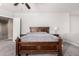Bedroom with neutral walls, ceiling fan, and a traditional bed at 1253 E Ivanhoe Ct, Gilbert, AZ 85295