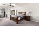 Bedroom with neutral walls, ceiling fan, and a traditional bed at 1253 E Ivanhoe Ct, Gilbert, AZ 85295