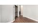 Bright bedroom with a walk-in closet and wood flooring at 1253 E Ivanhoe Ct, Gilbert, AZ 85295