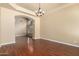 Open living room with hardwood floors and neutral wall-tones at 1253 E Ivanhoe Ct, Gilbert, AZ 85295