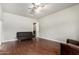Open-concept living area with hardwood floors and neutral walls at 1253 E Ivanhoe Ct, Gilbert, AZ 85295