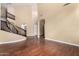 Bright living room with hardwood floors, soaring ceilings, and an open floorplan at 1253 E Ivanhoe Ct, Gilbert, AZ 85295