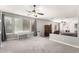 Bright and spacious main bedroom boasts natural light and ceiling fan at 1253 E Ivanhoe Ct, Gilbert, AZ 85295