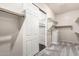 Spacious walk-in closet with custom shelving and natural light at 1253 E Ivanhoe Ct, Gilbert, AZ 85295