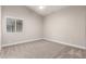 This bedroom offers natural light, plush carpeting, and a neutral color scheme, creating a serene atmosphere at 1333 E Bermuda Bay Ct, Gilbert, AZ 85234