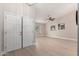 Welcoming entryway featuring double doors, soaring ceilings, neutral paint colors, and beautiful wood-look tile floors at 1333 E Bermuda Bay Ct, Gilbert, AZ 85234