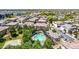 Aerial view of a neighborhood featuring a community pool and spa in a green common area at 14870 W Encanto Blvd # 1061, Goodyear, AZ 85395