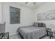 Cozy bedroom with natural light, a ceiling fan, and modern decor at 14870 W Encanto Blvd # 1061, Goodyear, AZ 85395