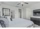Spacious main bedroom featuring a comfortable bed, closet, and modern decor at 14870 W Encanto Blvd # 1061, Goodyear, AZ 85395