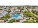 Aerial view of the community pool and surrounding residential area, showcasing well-kept landscaping and amenities at 15815 N 4Th Dr, Phoenix, AZ 85023