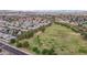 High-angle view of the community, showcasing residential properties, greenery, and a large field, perfect for families at 15815 N 4Th Dr, Phoenix, AZ 85023
