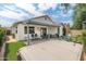 Home's backyard with covered patio, artificial turf, outdoor seating and hot tub at 15815 N 4Th Dr, Phoenix, AZ 85023