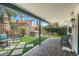 Backyard features a covered patio, artificial turf, and a hot tub at 15815 N 4Th Dr, Phoenix, AZ 85023