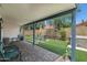 Backyard with covered patio, outdoor seating, artificial turf, and a hot tub at 15815 N 4Th Dr, Phoenix, AZ 85023