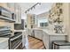 Modern kitchen featuring sleek cabinetry, stainless steel appliances, and updated countertops at 15815 N 4Th Dr, Phoenix, AZ 85023