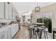 Eat-in kitchen area with a round table and seating, featuring views of the exterior at 15815 N 4Th Dr, Phoenix, AZ 85023