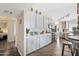 Bright kitchen featuring modern appliances, ample cabinet space, and wood flooring at 15815 N 4Th Dr, Phoenix, AZ 85023