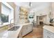 Bright kitchen featuring white quartz countertops, modern stainless appliances and hardwood floors at 15815 N 4Th Dr, Phoenix, AZ 85023
