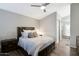 Comfortable bedroom featuring a king bed, ceiling fan, and ensuite bathroom at 15815 N 4Th Dr, Phoenix, AZ 85023