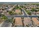 High aerial view of homes in a neighborhood, displaying desert landscaping at 15902 W Hearn Rd, Surprise, AZ 85379