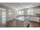 Stylish kitchen with a central island and stainless steel appliances at 15902 W Hearn Rd, Surprise, AZ 85379