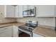 Close up of a stainless steel oven with counter top space at 15902 W Hearn Rd, Surprise, AZ 85379