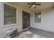 Outdoor patio with a ceiling fan, privacy, and a seating area at 15902 W Hearn Rd, Surprise, AZ 85379