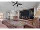Spacious living room featuring comfortable seating, a modern media center, and a layout perfect for relaxing or entertaining guests at 16444 W Chuparosa Ln, Surprise, AZ 85387