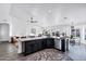 A spacious kitchen boasts stainless appliances, dark cabinetry, and ample counter space at 16662 S 37Th Way, Phoenix, AZ 85048