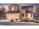 Charming two-story home with a two car garage and manicured front yard at 17644 W Palo Verde Dr, Litchfield Park, AZ 85340