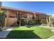 Charming apartment featuring well-maintained landscaping, private balconies, and convenient stair access at 1831 W Mulberry Dr # 241, Phoenix, AZ 85015