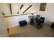 Upper-level loft features a modern desk setup and unique architectural design at 1831 W Mulberry Dr # 241, Phoenix, AZ 85015
