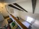 Loft area overlooking the living space with unique architectural details and natural light at 1831 W Mulberry Dr # 241, Phoenix, AZ 85015