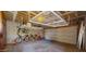 Well-organized garage with overhead storage and ample space for vehicles and bicycles at 1910 E Citation Ln, Tempe, AZ 85284