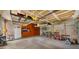 Spacious garage interior with overhead storage racks, suitable for multiple vehicles and equipment at 1910 E Citation Ln, Tempe, AZ 85284