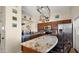Spacious kitchen with granite countertops, stainless steel appliances, an island with seating and ample cabinet space at 1910 E Citation Ln, Tempe, AZ 85284